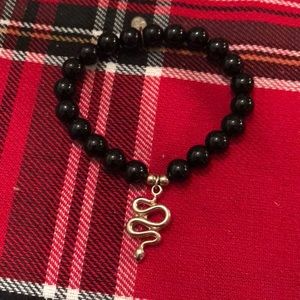 Black bead stretch bracelet w snake charm